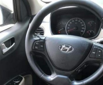 Hyundai Grand i10 2015 - Cần bán lại xe Hyundai Grand i10 năm sản xuất 2015, màu bạc 