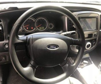 Ford Escape 2.3AT 2011 - Cần bán lại xe Ford Escape 2.3AT sản xuất 2011, màu đen xe gia đình