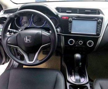 Honda City 1.5AT   2015 - Bán ô tô Honda City 1.5AT năm sản xuất 2015, màu nâu số tự động