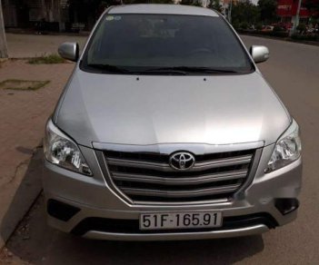 Toyota Innova 2015 - Cần bán xe Toyota Innova đời 2015, màu bạc xe gia đình