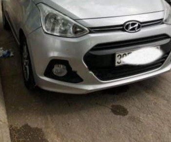 Hyundai Grand i10 2015 - Cần bán lại xe Hyundai Grand i10 năm sản xuất 2015, màu bạc 