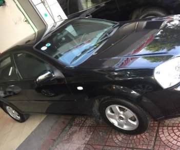 Chevrolet Lacetti 1.6 MT 2014 - Cần bán xe Chevrolet Lacetti 1.6 MT đời 2014, màu đen  