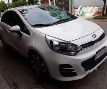 Kia Rio  1.4AT 2015 - Bán Kia Rio 1.4AT đời 2015, màu trắng, nhập khẩu nguyên chiếc số tự động giá cạnh tranh