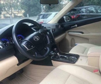 Toyota Camry 2.0 AT 2016 - Cần bán xe Toyota Camry 2.0 AT năm sản xuất 2016, màu vàng cát, giá chỉ 877 triệu