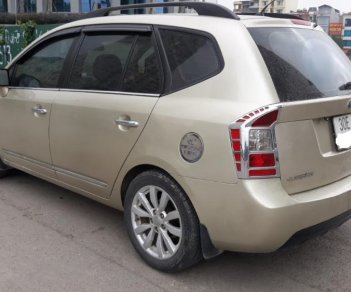 Kia Carens EX 2011 - Cần bán Kia Carens đời 2011 bản đủ - máy 2.0 - cửa nóc – màu vàng cát