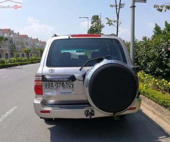 Toyota Land Cruiser GX 4.5 2001 - Cần bán lại xe Toyota Land Cruiser GX 4.5 sản xuất 2001, màu phấn hồng chính chủ