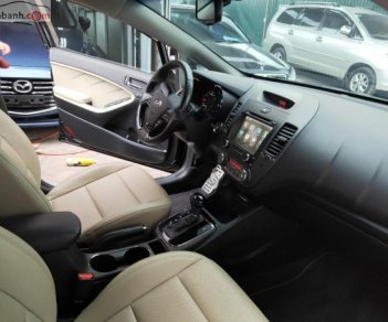Kia Cerato 1.6 AT 2017 - Cần bán lại xe Kia Cerato 1.6 AT sản xuất 2017, màu đen, giá chỉ 612 triệu