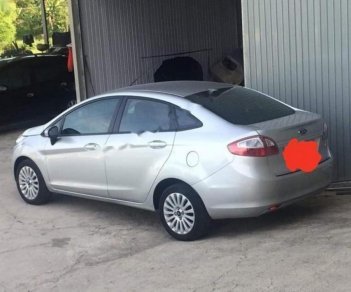 Ford Fiesta 2011 - Chính chủ cần bán lại xe Ford Fiesta 2011, màu bạc 