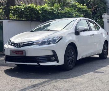 Toyota Corolla altis 1.8E CVT 2017 - Bán xe Toyota Corolla altis 1.8E CVT 2017, màu trắng giá tốt