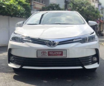 Toyota Corolla altis 1.8E CVT 2017 - Bán xe Toyota Corolla altis 1.8E CVT 2017, màu trắng giá tốt