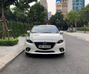 Mazda 3 2.0 2015 - Bán xe Mazda 3 2.0 2015, màu trắng, 625 triệu