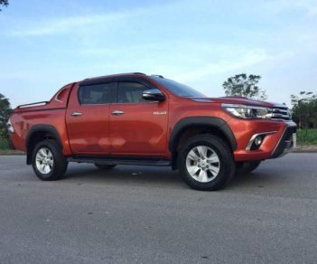 Toyota Hilux 2015 - Bán xe Toyota Hilux sản xuất 2015, màu đỏ, nhập khẩu nguyên chiếc số tự động, giá chỉ 720 triệu