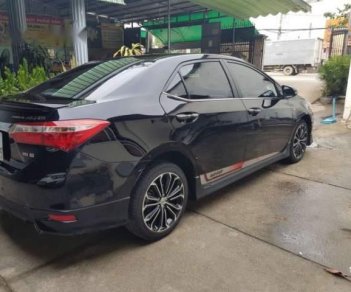 Toyota Corolla altis  2.0V 2014 - Cần bán lại xe Toyota Corolla altis 2.0V sản xuất 2014, màu đen, giá chỉ 685 triệu