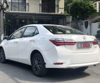 Toyota Corolla altis 1.8E CVT 2017 - Bán xe Toyota Corolla altis 1.8E CVT 2017, màu trắng giá tốt