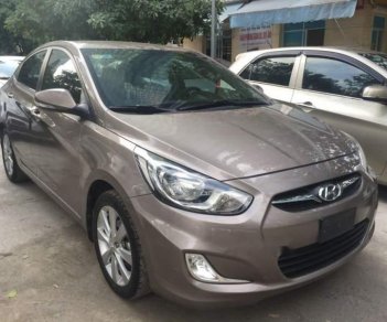 Hyundai Accent   2014 - Bán lại xe Hyundai Accent sản xuất năm 2014, màu nâu, nhập khẩu