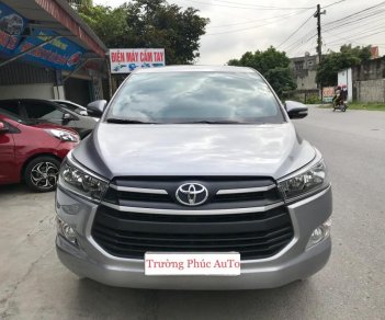 Toyota Innova MT 2.0 2016 - Bán xe Toyota Innova MT 2.0 năm sản xuất 2016, màu bạc, 695tr