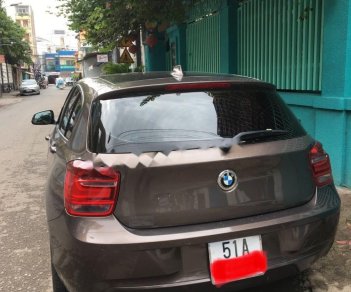 BMW 1 Series 116i 2014 - Bán BMW 1 Series 116i năm sản xuất 2014, màu nâu, xe nhập, giá 850tr