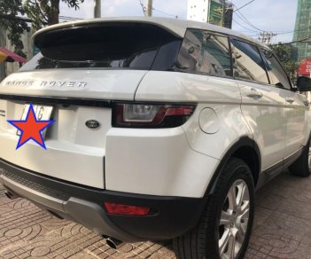 LandRover Evoque 2017 - Cần bán LandRover Evoque 2017, màu trắng, bảo hành, xe chạy 2462 km, đèn mới