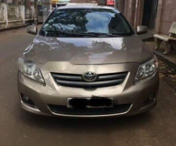 Toyota Corolla altis   2009 - Cần bán xe Toyota Corolla altis sản xuất năm 2009, màu vàng ít sử dụng