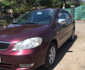 Toyota Corolla altis 1.8G 2002 - Gia đình bán Toyota Corolla Altis 1.8G năm 2002, màu đỏ