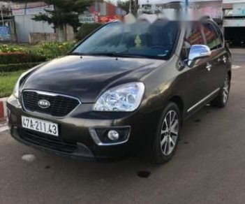 Kia Carens   S  2014 - Bán xe Kia Carens S năm 2014, màu nâu, xe như mới, giá tốt