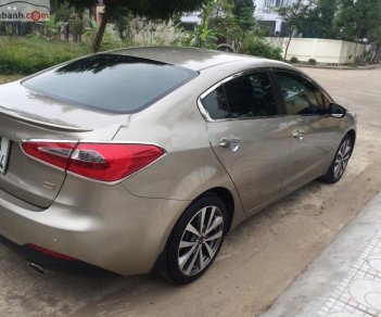 Kia K3 2015 - Chính chủ bán xe Kia K3 đời 2015, màu vàng cát