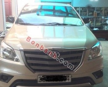 Toyota Innova   2.0E MT  2014 - Gia đình bán xe Toyota Innova 2.0E MT năm 2014, màu vàng cát