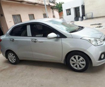 Hyundai Grand i10   2016 - Cần bán lại xe Hyundai Grand i10 năm 2016, màu bạc