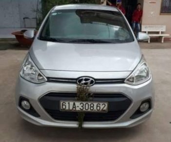 Hyundai Grand i10   2016 - Cần bán lại xe Hyundai Grand i10 năm 2016, màu bạc