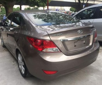 Hyundai Accent   2014 - Bán lại xe Hyundai Accent sản xuất năm 2014, màu nâu, nhập khẩu