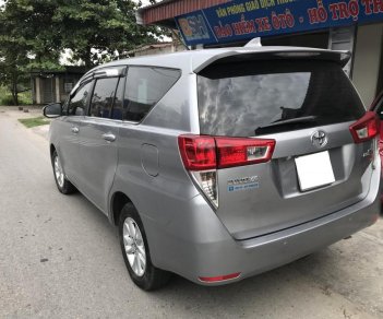 Toyota Innova MT 2.0 2016 - Bán xe Toyota Innova MT 2.0 năm sản xuất 2016, màu bạc, 695tr