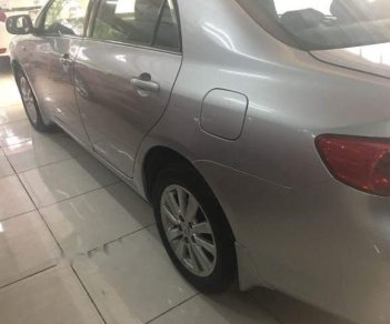 Toyota Corolla altis   2009 - Cần bán Toyota Corolla altis sản xuất 2009, màu bạc, nhập khẩu