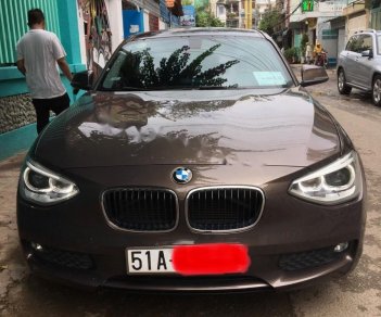 BMW 1 Series 116i 2014 - Bán BMW 1 Series 116i năm sản xuất 2014, màu nâu, xe nhập, giá 850tr