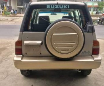 Suzuki Vitara   2003 - Bán Suzuki Vitara đời 2003, màu vàng chính chủ