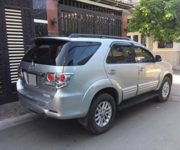 Toyota Fortuner 2012 - Cần tiền bán Fortuner 2012 đăng ký 2013, số tự động, máy xăng, màu bạc