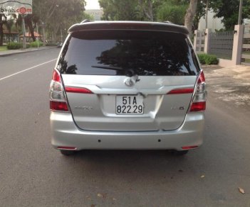 Toyota Innova G 2014 - Cần bán Toyota Innova G 2014, màu bạc xe gia đình, giá 585tr