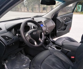 Hyundai Tucson 2.0 AT.  2011 - Cần bán lại xe Hyundai Tucson 2.0 AT. Sản xuất năm 2011, màu đen, xe nhập