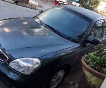 Daewoo Nubira 2001 - Cần bán Daewoo Nubira 2001, màu đen, giá chỉ 115 triệu