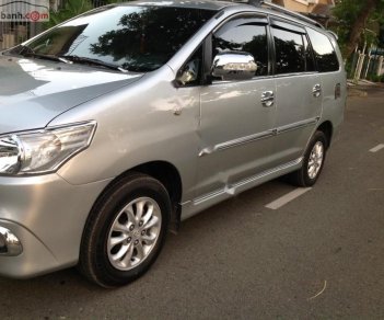 Toyota Innova G 2014 - Cần bán Toyota Innova G 2014, màu bạc xe gia đình, giá 585tr