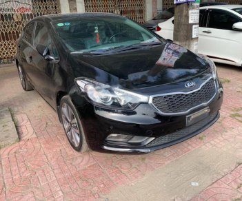 Kia K3 1.6 2015 - Bán Kia K3 1.6 sản xuất năm 2015, màu đen số tự động, giá chỉ 518 triệu