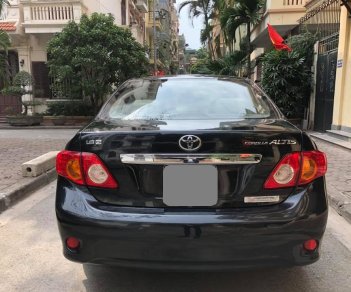 Toyota Corolla altis MT 2009 - Cần bán xe Toyota Corolla altis MT năm 2009, màu bạc chính chủ