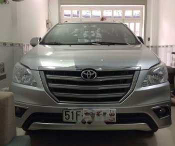 Toyota Innova   E  2015 - Chính chủ bán Toyota Innova E năm sản xuất 2015, màu bạc, 586tr