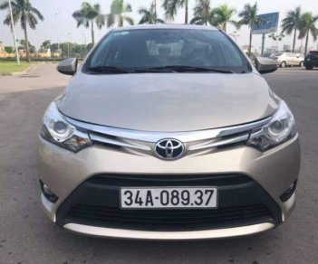 Toyota Vios G 1.5AT 2014 - Bán Toyota Vios G 1.5AT sản xuất năm 2014, màu vàng như mới