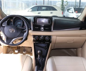 Toyota Vios E 1.5MT 2015 - Bán Toyota Vios E 1.5MT năm sản xuất 2015, màu bạc giá cạnh tranh