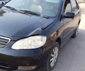 Toyota Corolla altis   2002 - Cần bán lại xe Toyota Corolla altis sản xuất 2002, màu đen, giá 145tr