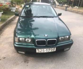 BMW 3 Series 320i 1998 - Cần bán xe BMW 3 Series 320i đời 1998, màu xanh lam, nhập khẩu nguyên chiếc số sàn