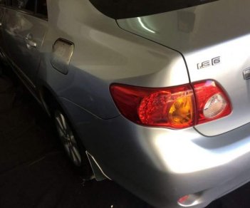 Toyota Corolla altis   1.8G 2009 - Cần bán lại xe Toyota Corolla altis 1.8G 2009, màu bạc 