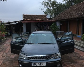 Ford Laser   1.8 MT  2002 - Cần bán xe Ford Laser 1.8 MT đời 2002, màu đen 