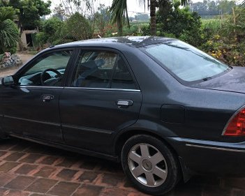 Ford Laser   1.8 MT  2002 - Cần bán xe Ford Laser 1.8 MT đời 2002, màu đen 