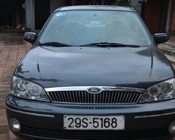 Ford Laser   1.8 MT  2002 - Cần bán xe Ford Laser 1.8 MT đời 2002, màu đen 